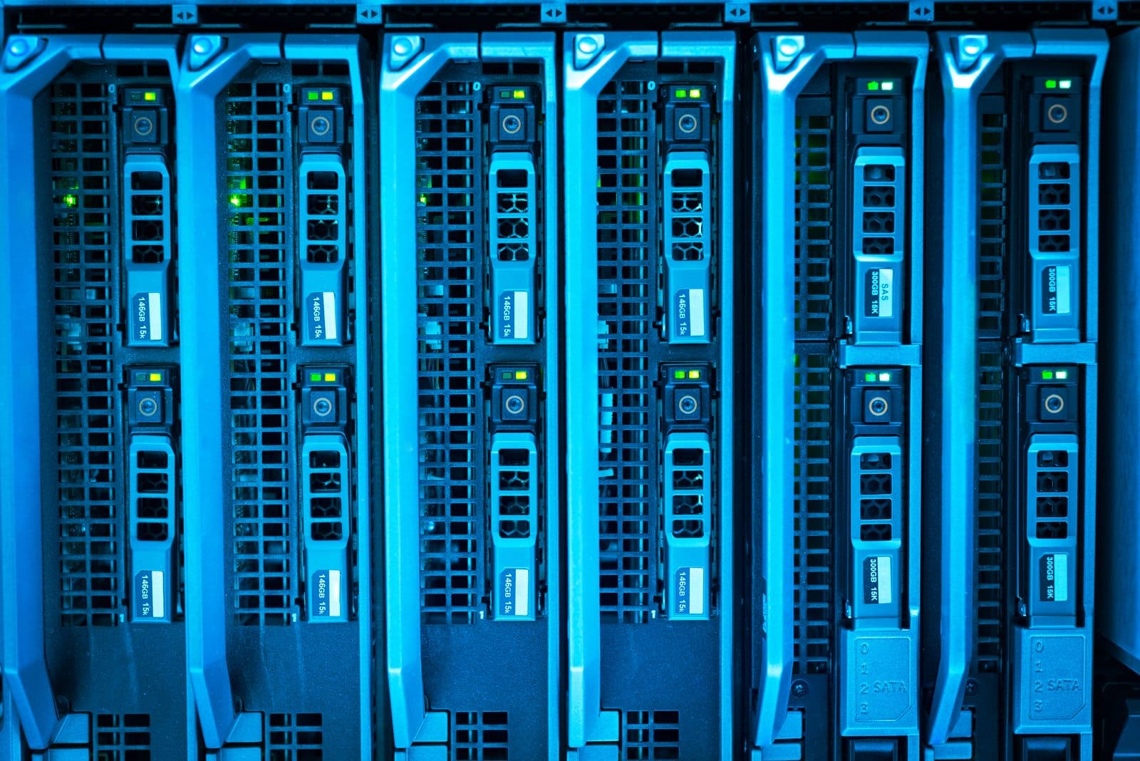 Row of blue-lit server blades in a rack, representing Philtek Surveillance's IT infrastructure services